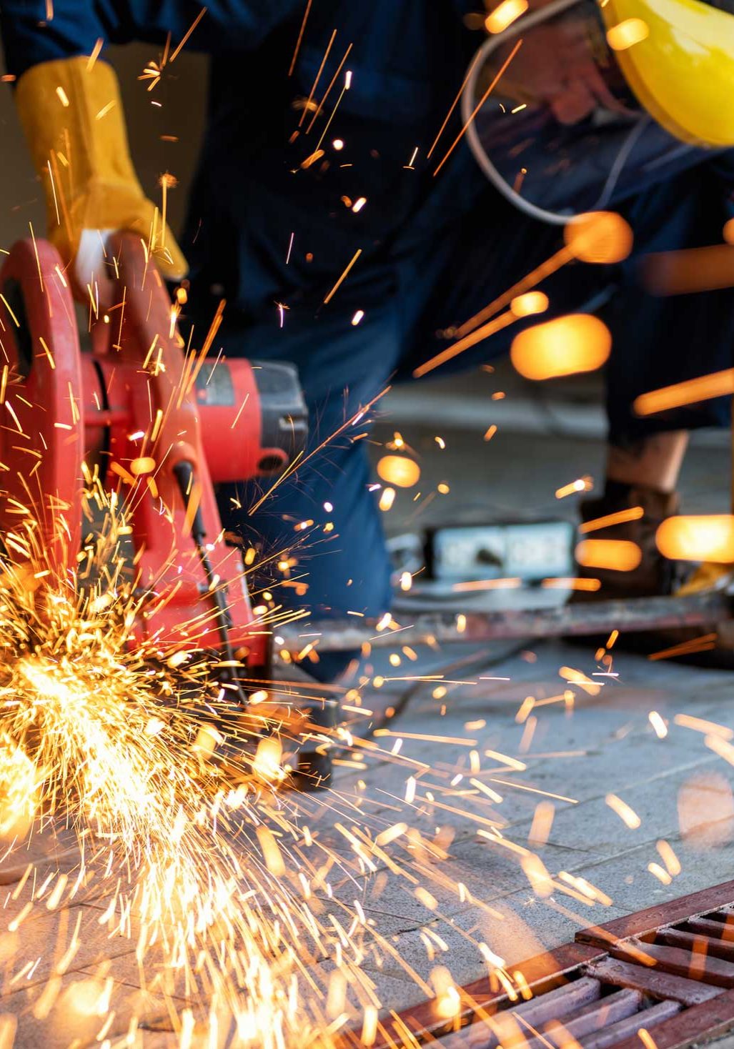 AW Associates Metalworker in protective clothing.